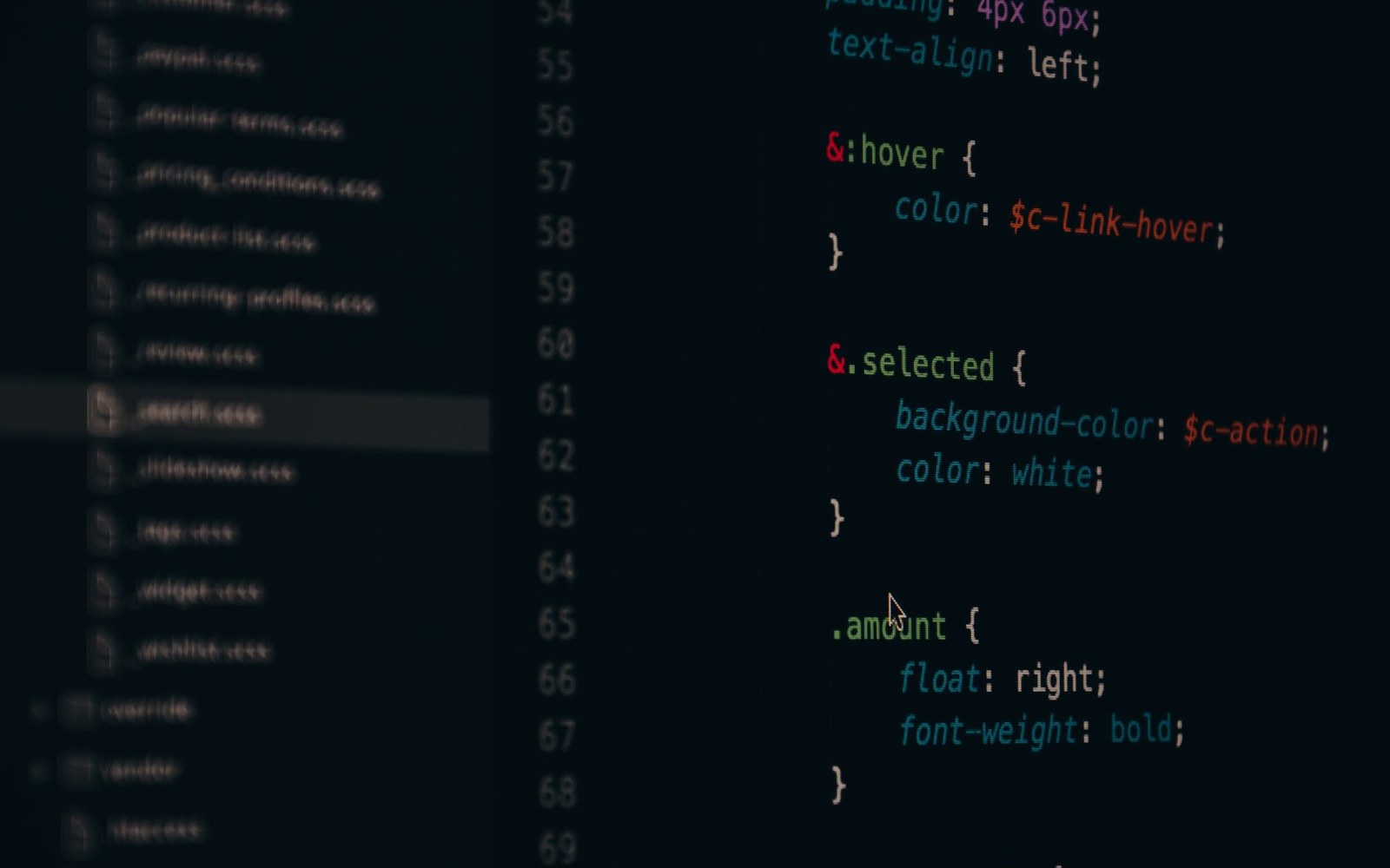Code editor screen displaying SCSS styling rules with syntax highlighting on a dark theme