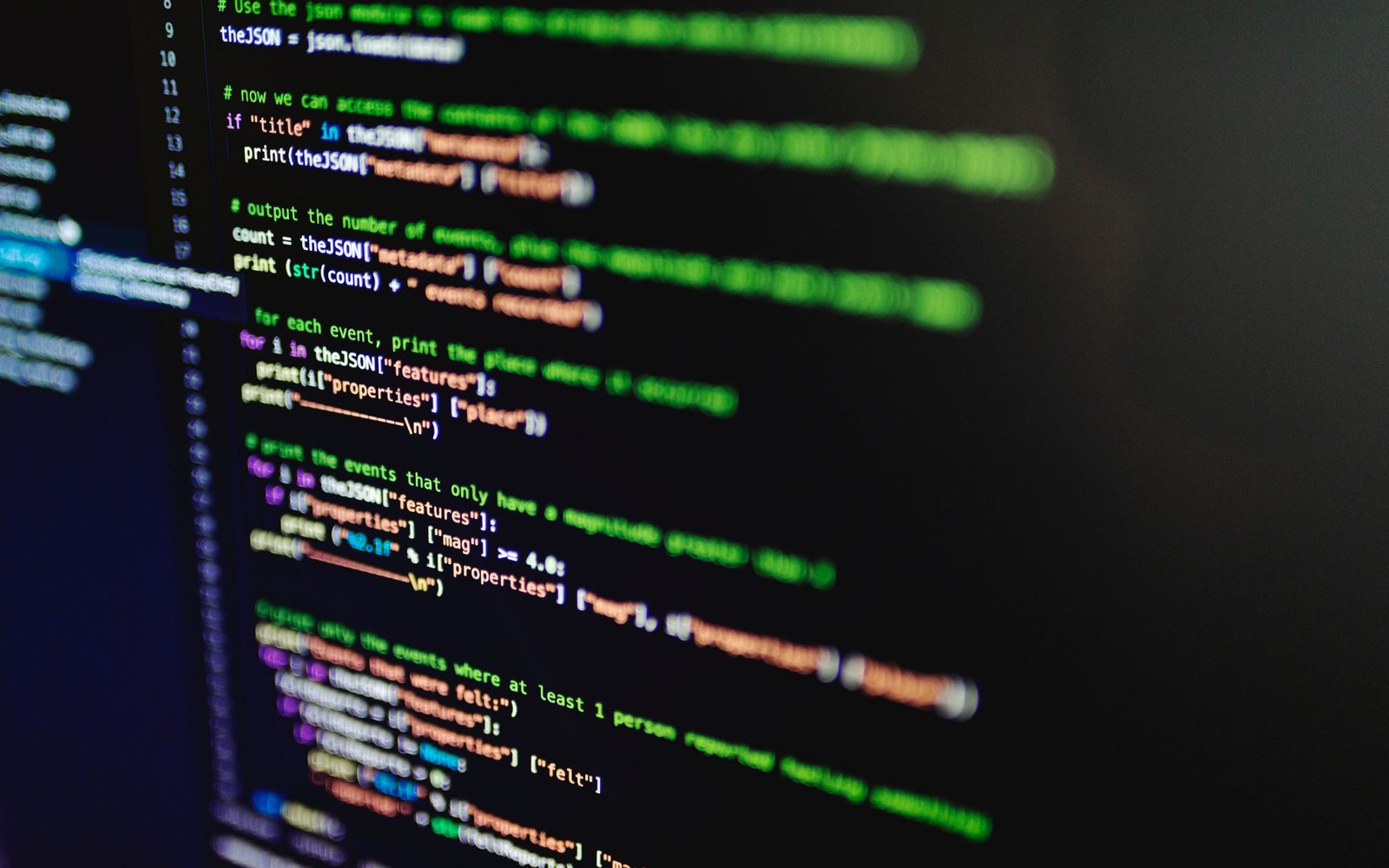 Python code on a dark screen showing a script parsing JSON event data